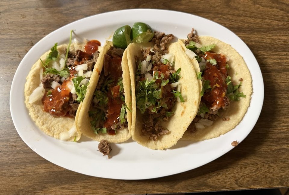 Printed menu with breakfast, fajitas, and soups.