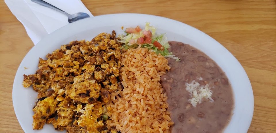 Close-up of a Mexican restaurant menu board.