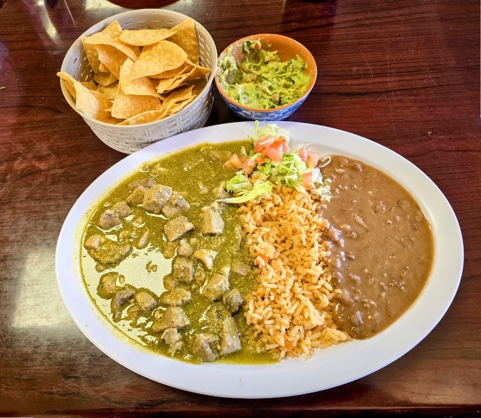 Printed menu with breakfast, fajitas, and soups.