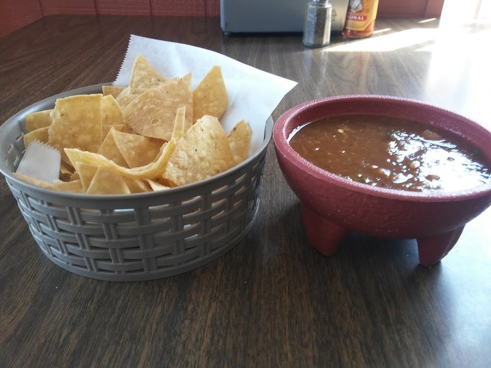 Close-up of a Mexican restaurant menu board.